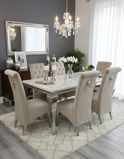 Louis white marble dining table with Sofia mink velvet chairs and lion knocker detail