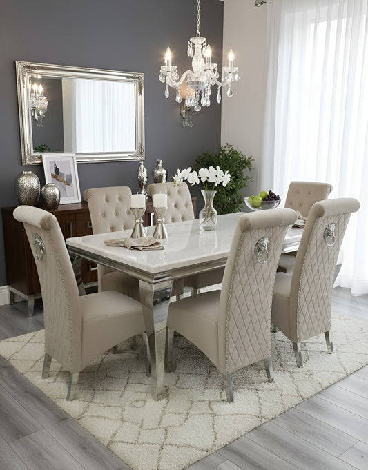 Louis white marble dining table with Sofia mink velvet chairs and lion knocker detail